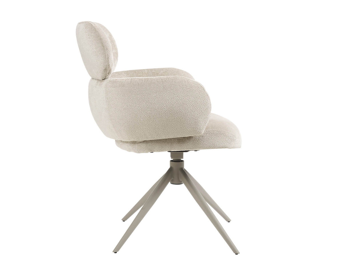 side angle of the apollo beige swivel dining chair