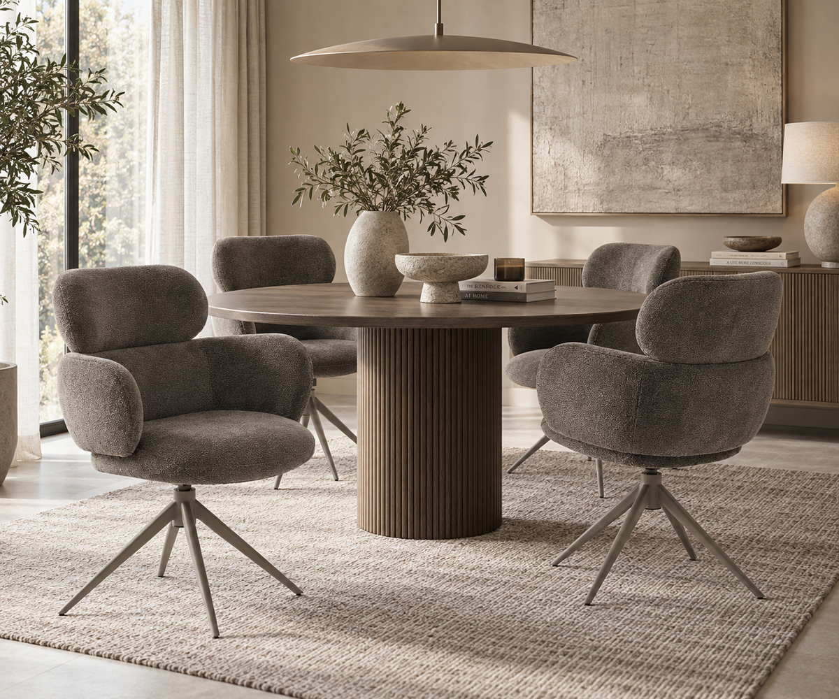 Apollo mocha dining chairs styled around a round fluted oak dining table in a warm modern dining room