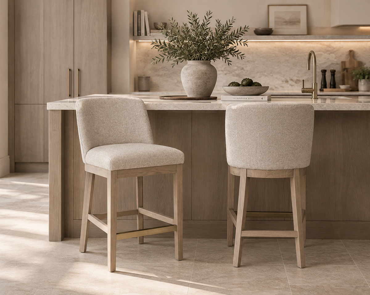 Two Denby Counter Stools in oatmeal at a light oak kitchen island – The Urban Company