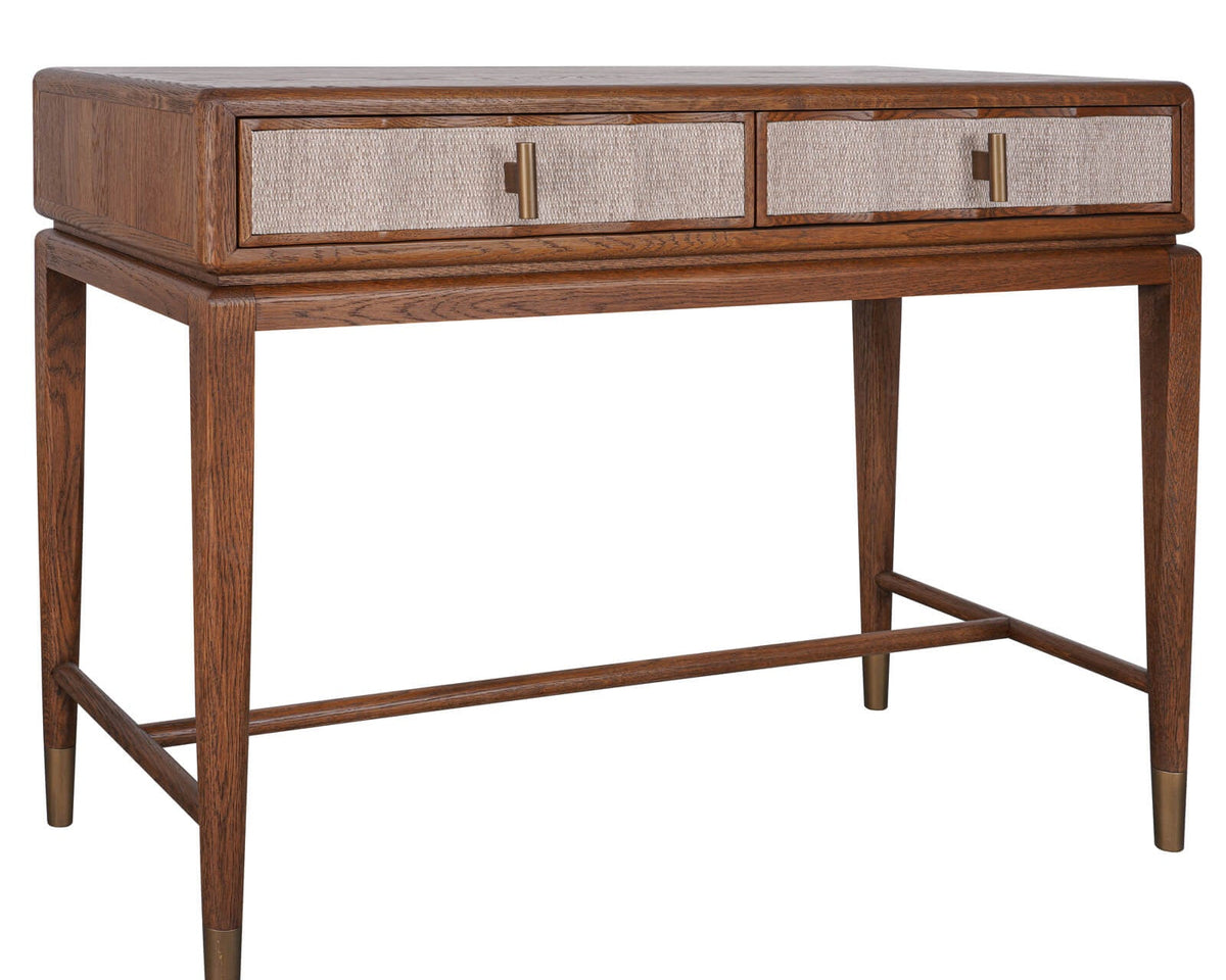 Angled view of the Birdlip oak console table showing textured drawer fronts, brass-toned handles and wooden frame