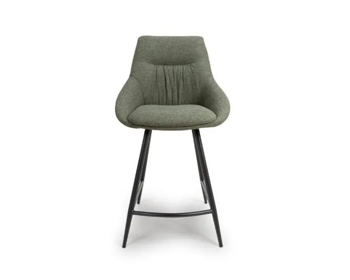 Green bar stool with black legs on a white background