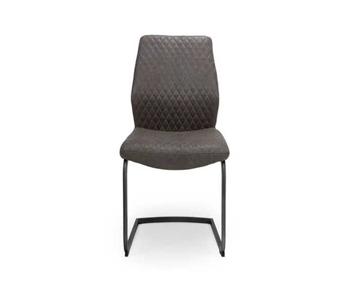 A modern dining chair with a dark brown quilted upholstered seat and backrest, supported by a sleek black metal cantilever base, shown against a plain white background.