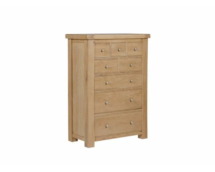Wooden dresser with multiple drawers on a white background