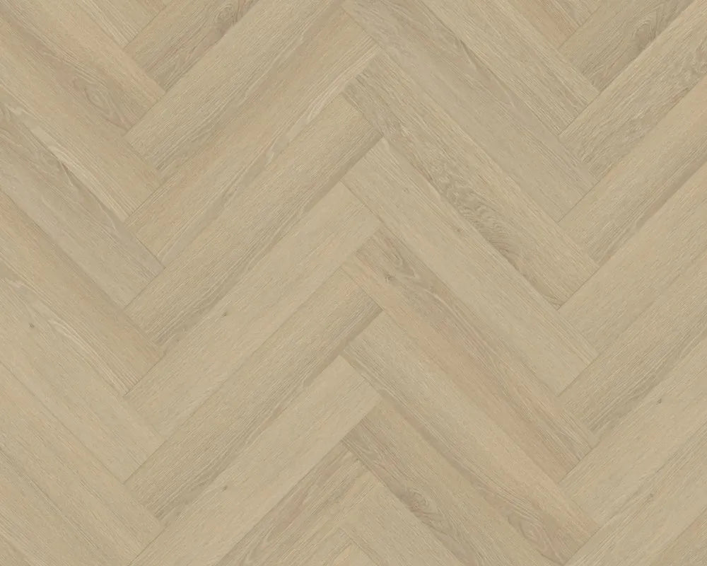 Light beige wood flooring shown in a herringbone pattern, featuring a natural oak-like grain texture.