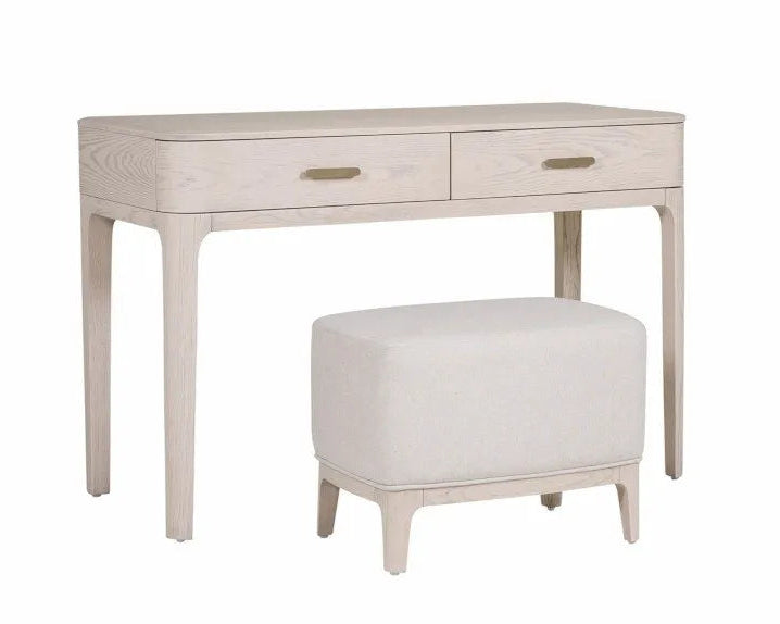 Light wood desk with two drawers and a matching ottoman on a white background