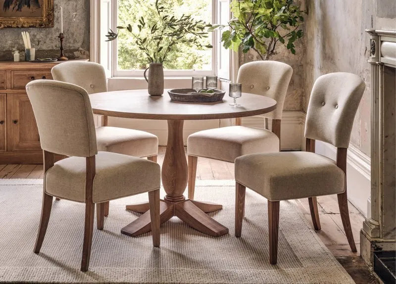 neutral dining room with oak and linen dining chairs