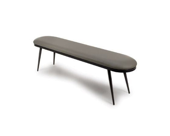 Angled view of the Axis dining bench upholstered in truffle faux leather.