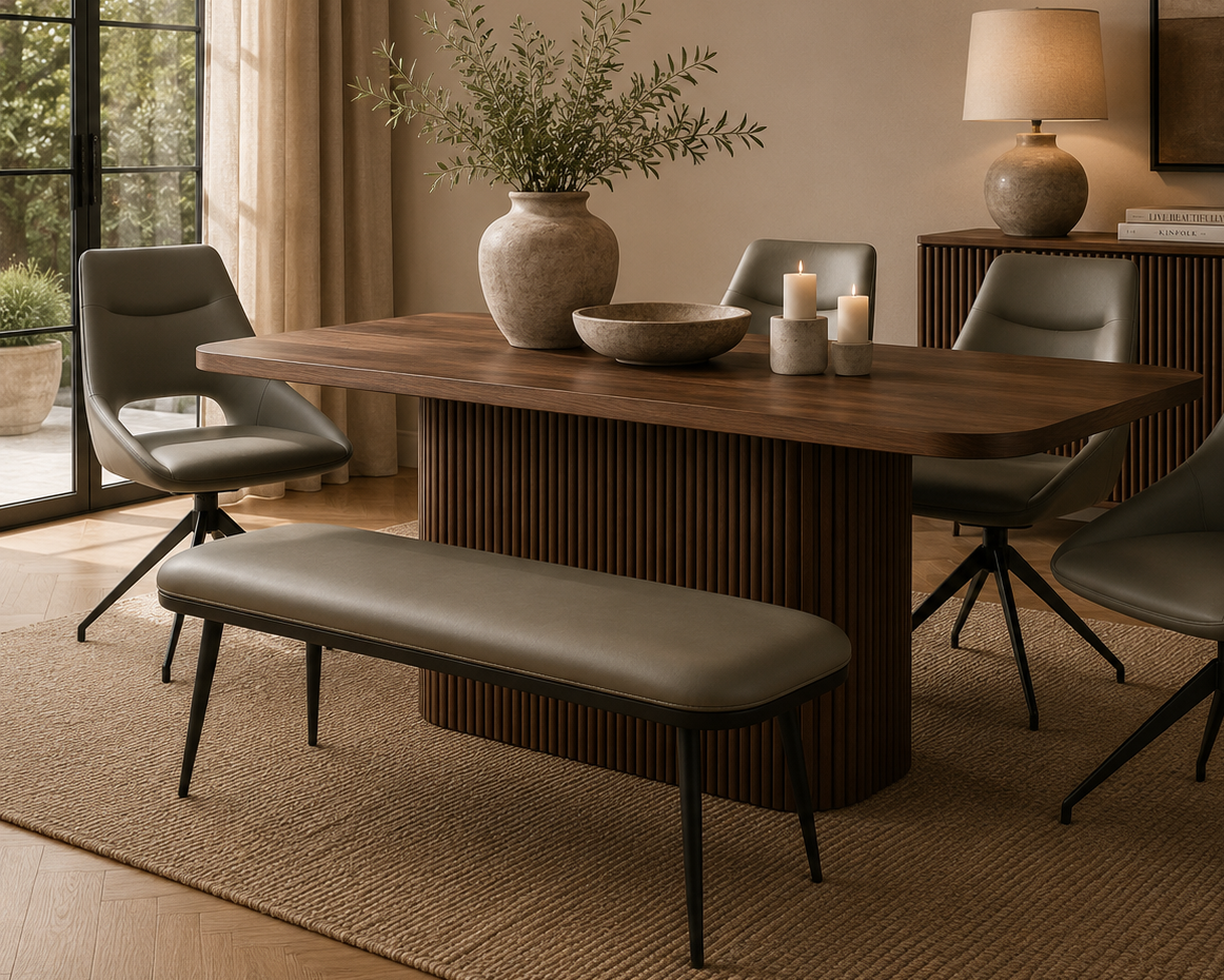 Axis dining bench in truffle faux leather styled with matching swivel dining chairs in a warm modern dining room.