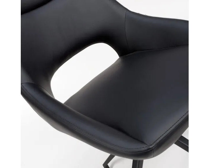 Close-up of black PU upholstered swivel dining chair seat