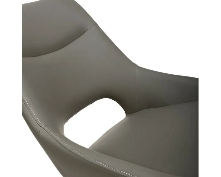 Close-up of truffle PU upholstered swivel dining chair seat