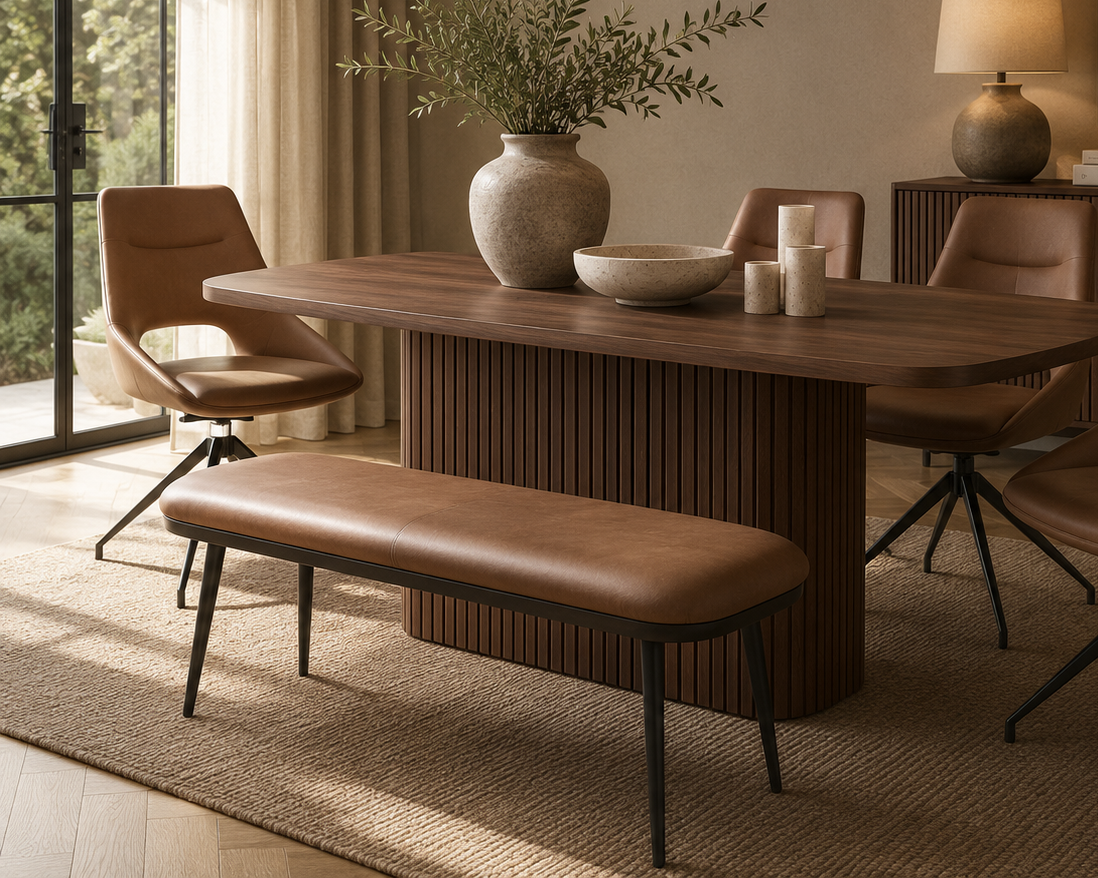 Axis tan faux leather dining bench paired with matching swivel dining chairs in a warm modern dining room.