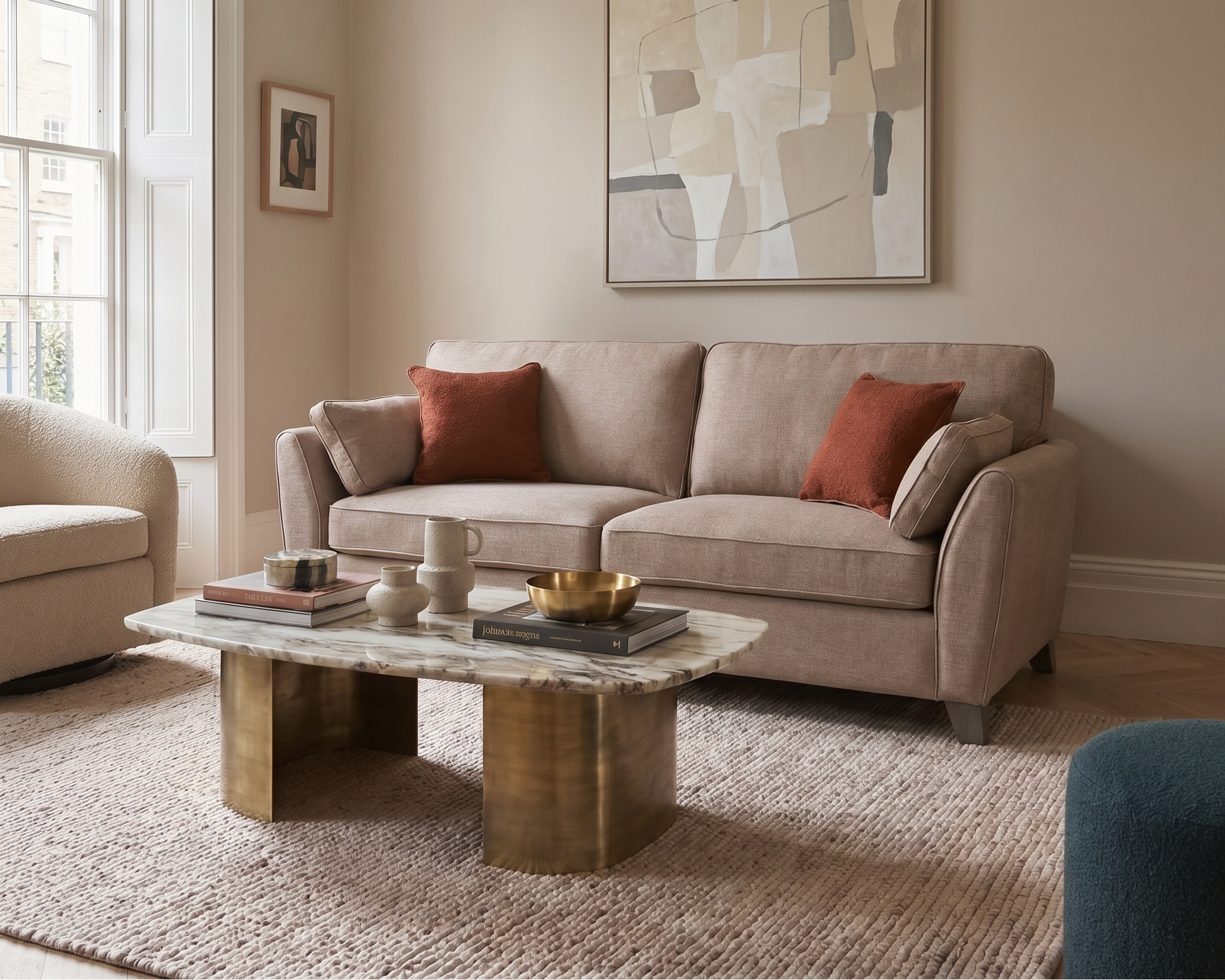 biscuit fabric 3 seater sofa styled in warm neutral living room with modern decor