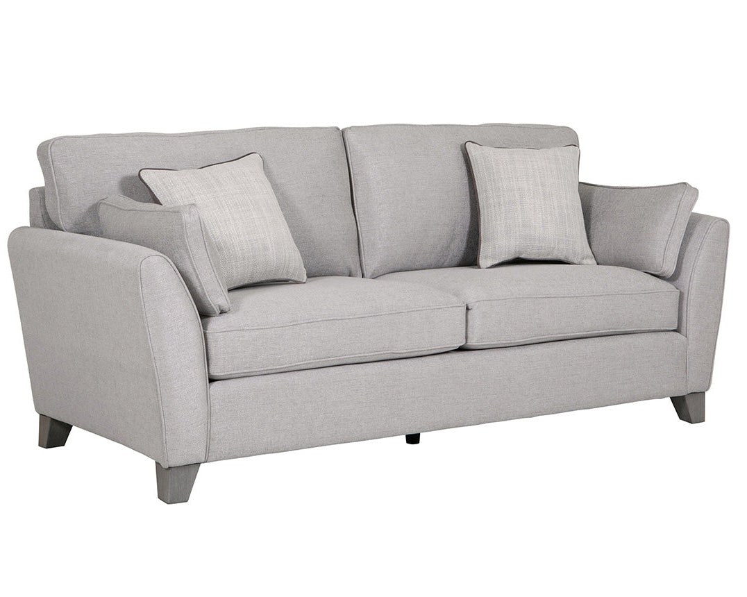 angle view of grey three seater sofa with linen look fabric and supportive cushions