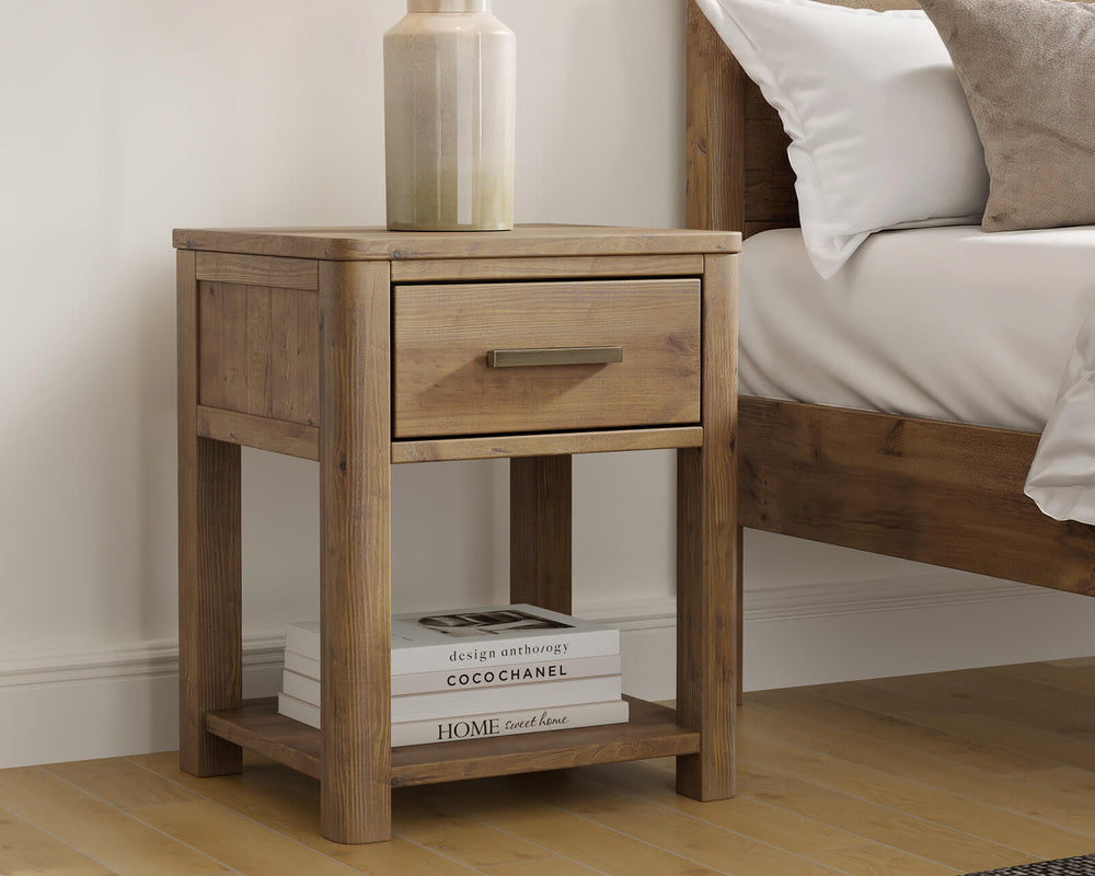 Inola bedside table in reclaimed pine Cashew finish beside bed