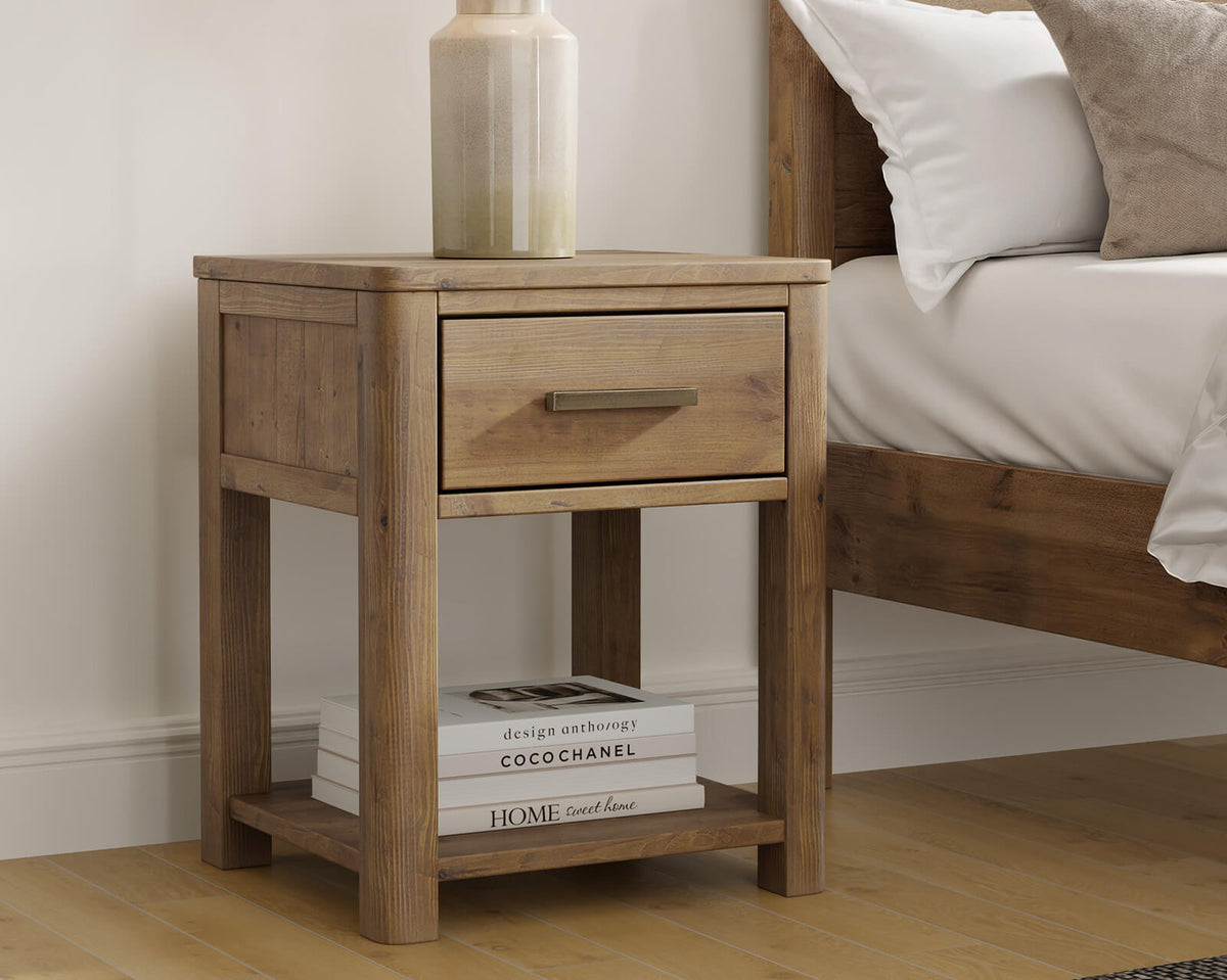 Inola bedside table in reclaimed pine Cashew finish beside bed