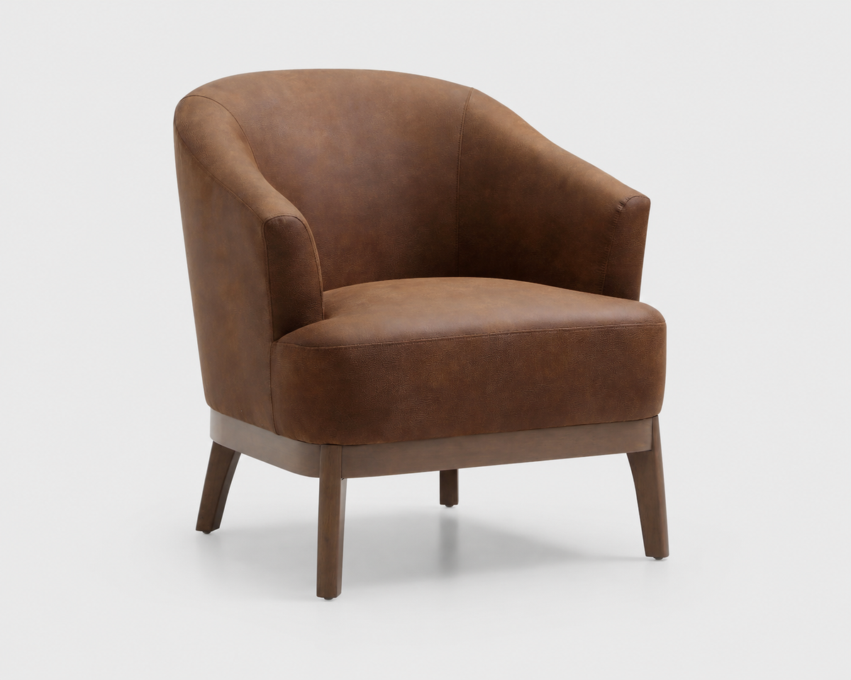 A brown leather barrel-style accent chair with a curved backrest and wooden legs, shown on a light gray background.