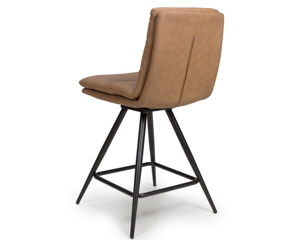 Brown bar stool with black metal legs on a white background