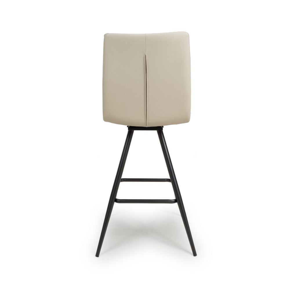 Beige bar stool with black metal legs on a white background