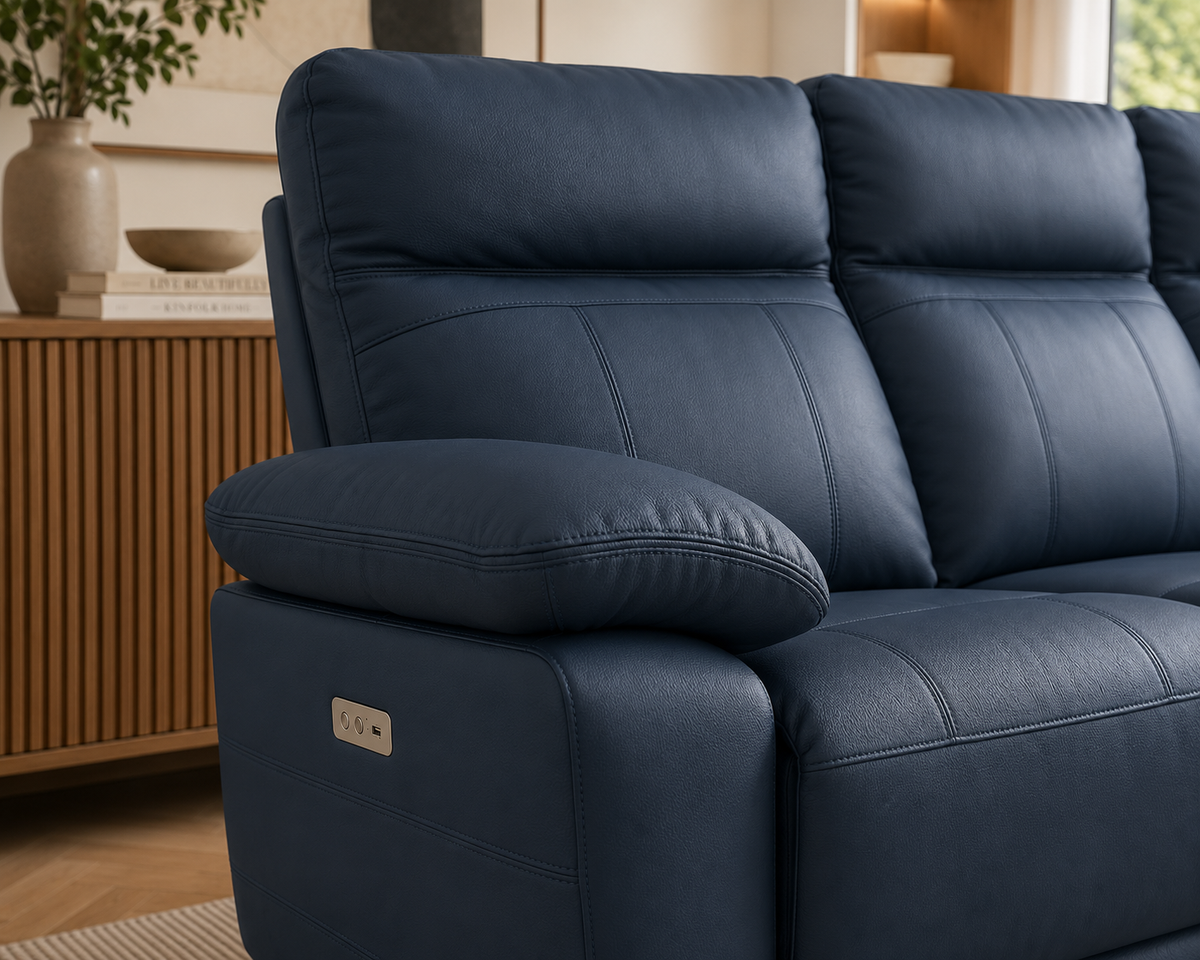 Close-up of the Positano 3 Seater Electric Reclining Leather Sofa in Indigo, highlighting the premium leather upholstery, supportive armrest and detailed stitching.