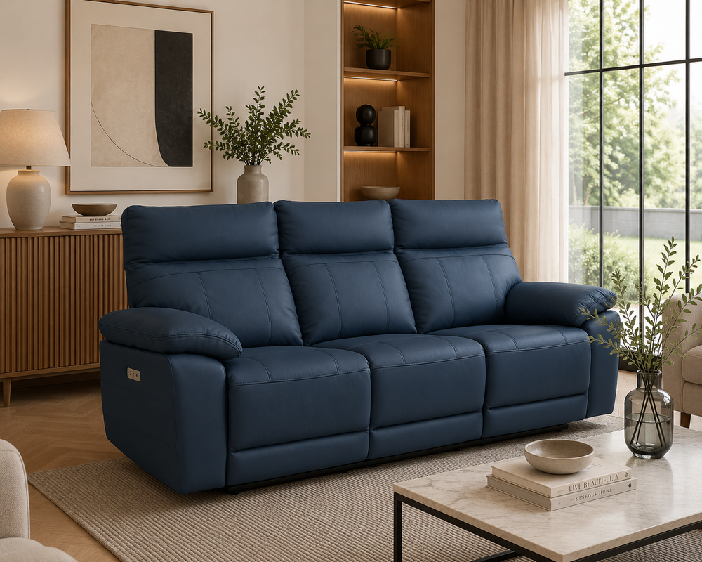 Positano 3 Seater Electric Reclining Leather Sofa in Indigo styled in a bright contemporary living room.