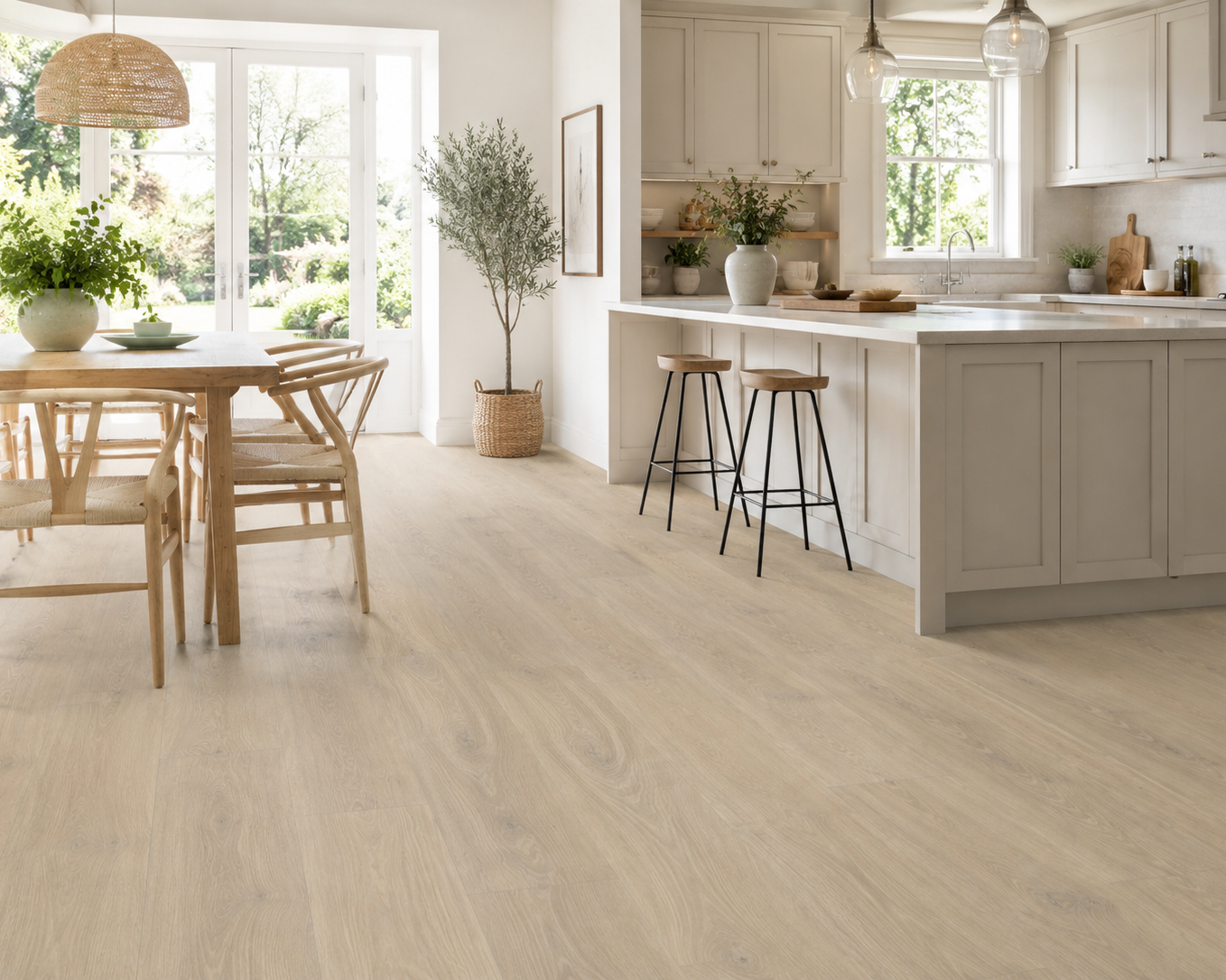 Seashell Oak Plank SPC Flooring in a bright kitchen and dining room